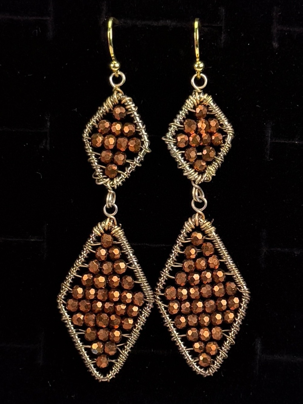 Beautiful aged goldtone and brown reflective beaded pierced earrings